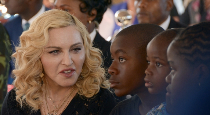 Madonna asks court to block love letter auction