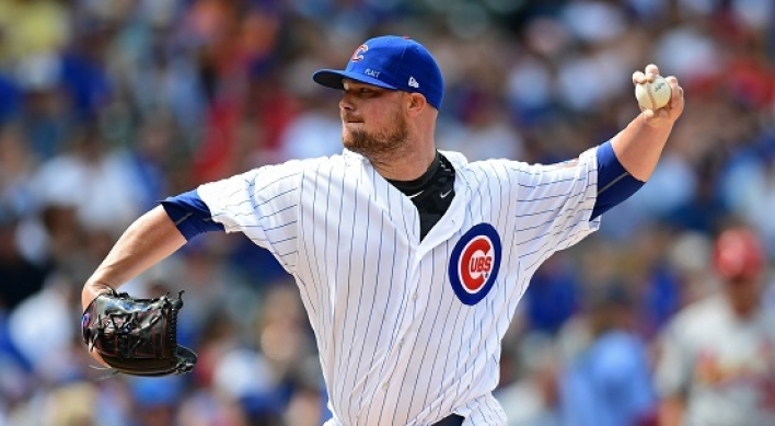 Lester hits first homer, throws 2,000th K in Cubs’ blowout win