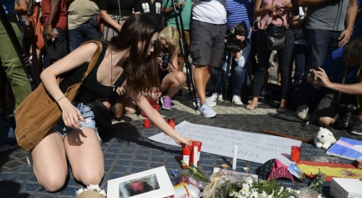 Tourists and Barcelona residents return to Las Ramblas