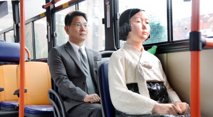 [Herald Interview] How comfort women statues got to ride Seoul buses