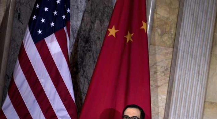 China urges US to drop new sanctions on Chinese companies