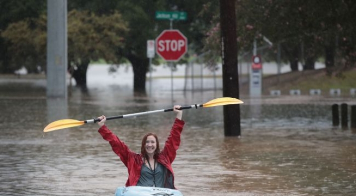 Rescuers pluck hundreds from rising floodwaters in Houston