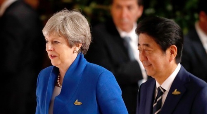 UK PM 'outraged' by N. Korea missile ahead of Japan trip