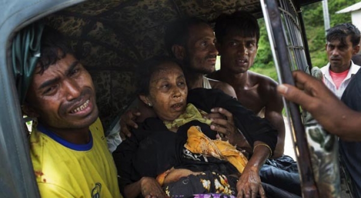 Myanmar accused of laying mines after refugee injuries