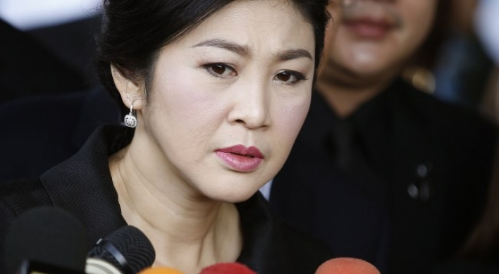 Ex-Thai leader sentenced in absentia to 5 years in prison