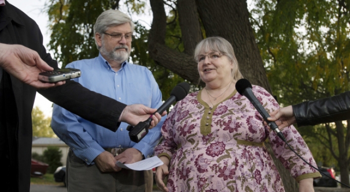 Family freed from captivity returns to Canada