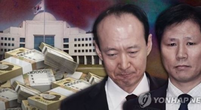 Two former Park aides arrested over bribery