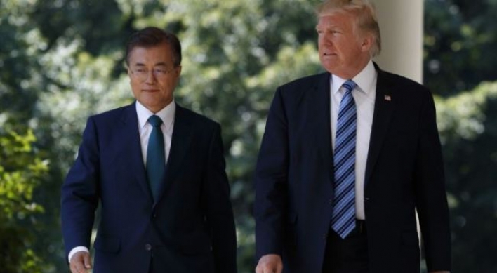 Moon greets Trump at US base