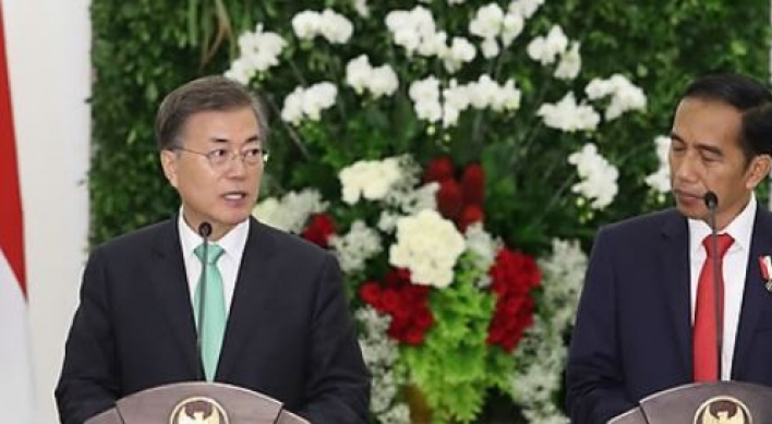 Korean leader heads to Vietnam for APEC, ending visit to Indonesia