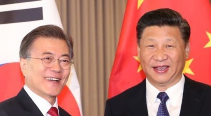 Moon, Xi to hold bilateral summit, normalize ties soured by THAAD