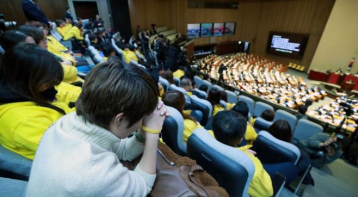 Parliament passes law to reinvestigate Sewol sinking