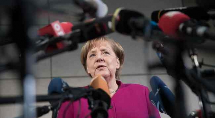 Merkel 'optimistic' in new bid to end political impasse