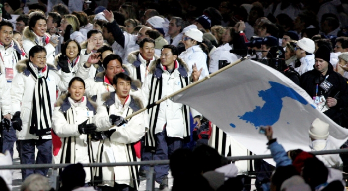 If two Koreas march together at Olympics, what flag do they raise?