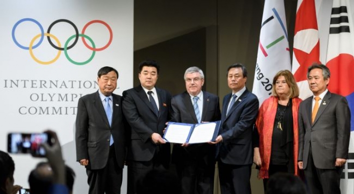 Talks open at Korean Olympic unity meeting in Switzerland