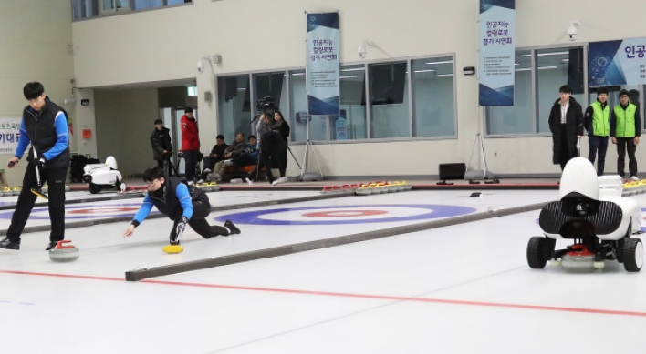 Human players beat AI robots in curling game
