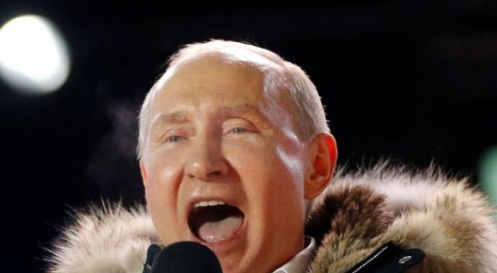 Putin claims crushing victory in Russian presidential vote