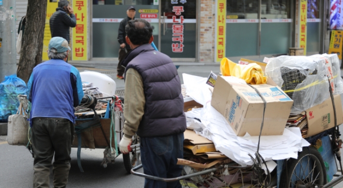 Busan district to offer ad-based support for waste paper collectors