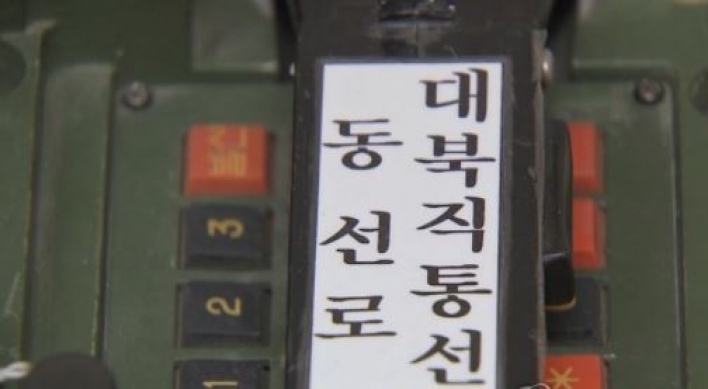 Koreas hold talks on telephone hotline between leaders