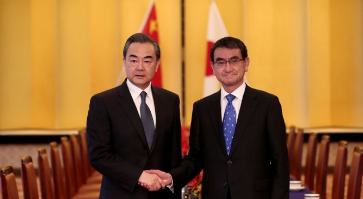 China FM visits Japan for talks on N. Korea, regional issues