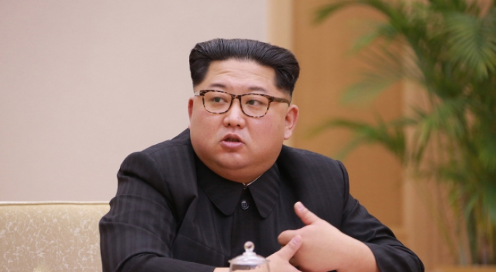 NK announces freeze on nuclear, missile tests