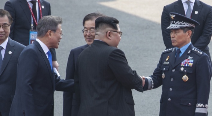 Different manners of greetings stress stark reality of unfinished war between Koreas