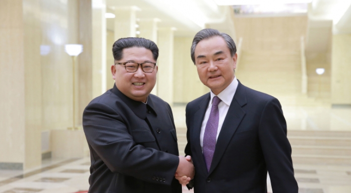 NK leader meets China's foreign minister over ties, inter-Korean issues