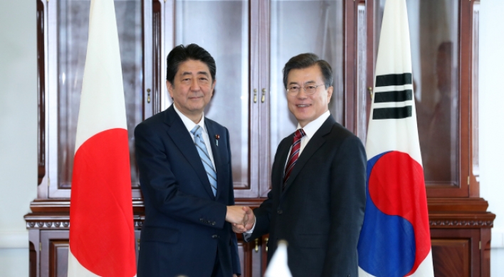 Moon calls for improved ties between Japan, N. Korea