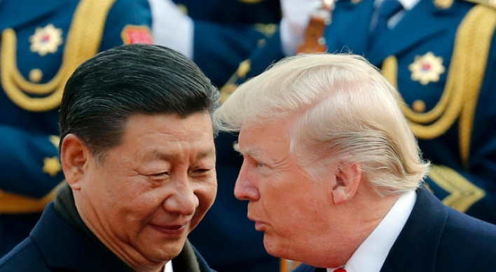 Trump, Xi agree to keep sanctions on NK until it denuclearizes