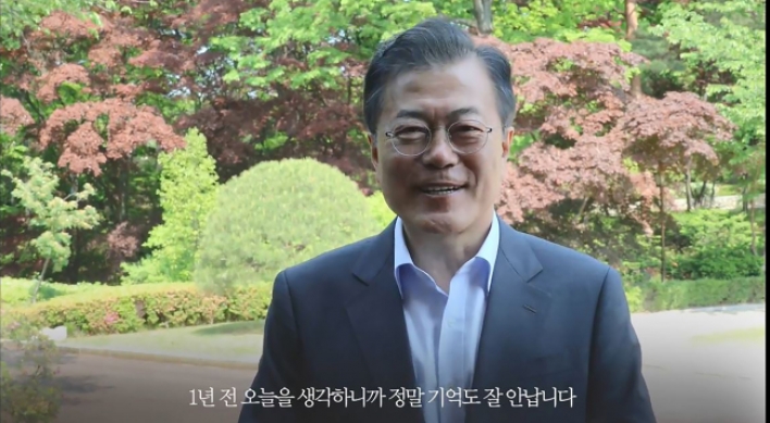 Moon quietly marks first year in office