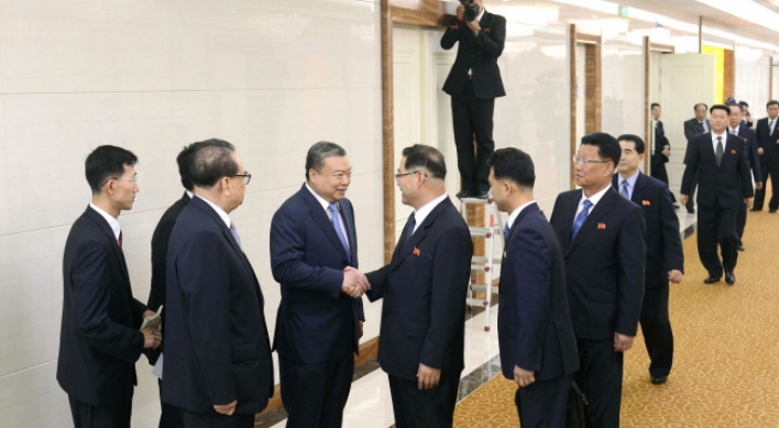 NK party officials visit China