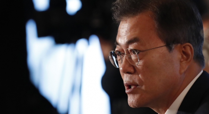 Moon commemorates 1980 democratic movement with pledge to find truth