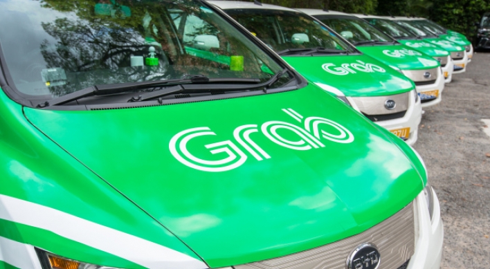 [From the Scene] Ride-hailing giant Grab joins hands with SK for lead in future mobility