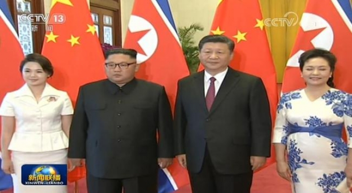 N. Korean leader Kim holds summit with Xi