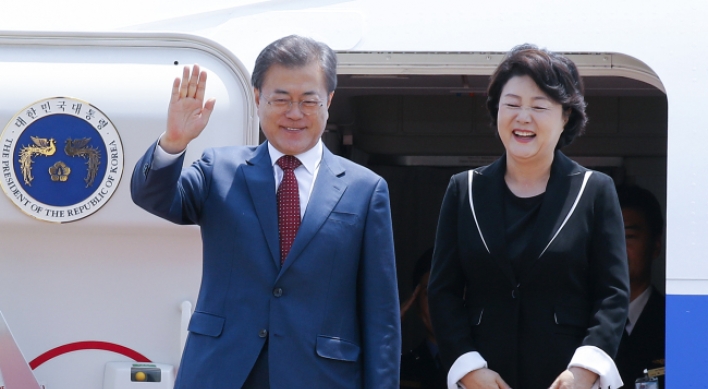 Moon returns from Russia visit