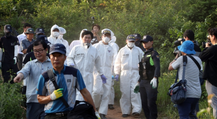 Autopsy to determine the identity of remains found on Gangjinsan