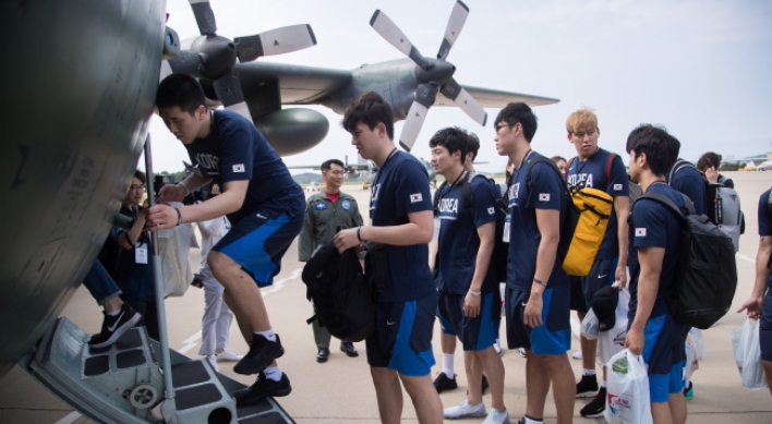 S. Korean delegation returns after trip to Pyongyang for basketball games