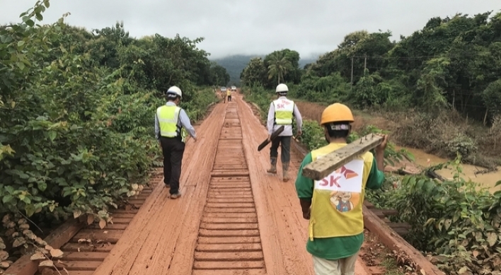 SK E&C mends road in Laos after dam collapse