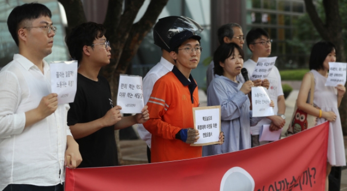 McDelivery riders protest stifling dress code