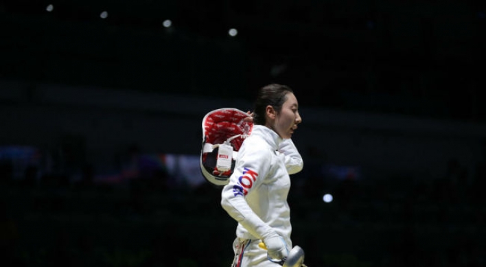 Star-crossed fencer finally puts Olympic controversy behind