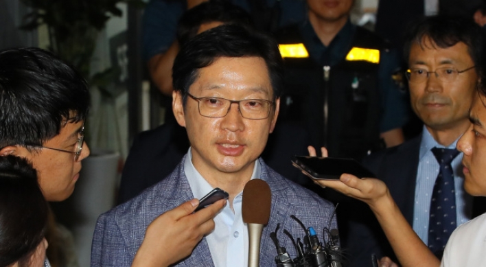 Gov. Kim heads home after overnight interrogation in opinion rigging probe