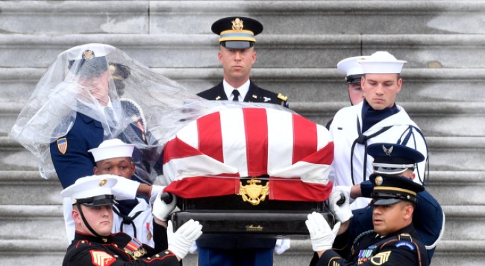 McCain ends 81-year journey with burial at Naval Academy