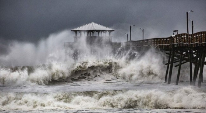 ‘Threat becomes reality’: Florence begins days of rain, wind