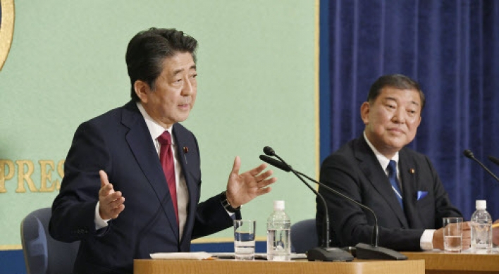 Abe aims to rewrite Japan constitution as he seeks 3rd term