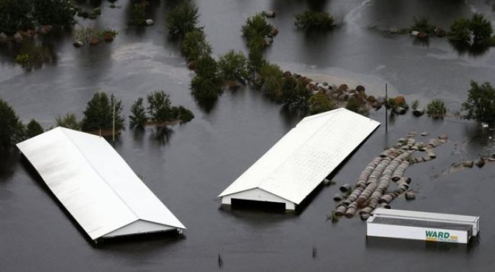 Flooding fears surge as rivers rise; Wilmington cut off