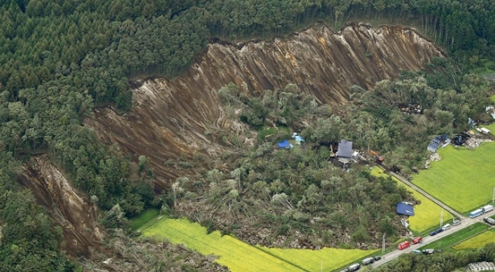 Quake shakes part of northern Japan hit by deadly landslides