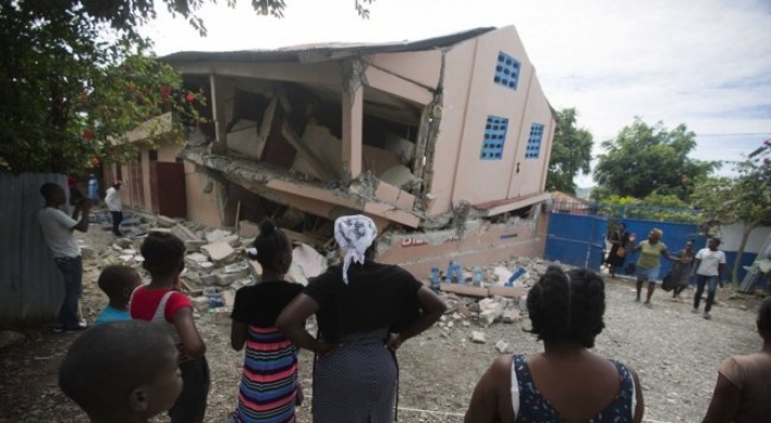 Strong aftershock rattles north Haiti day after deadly quake