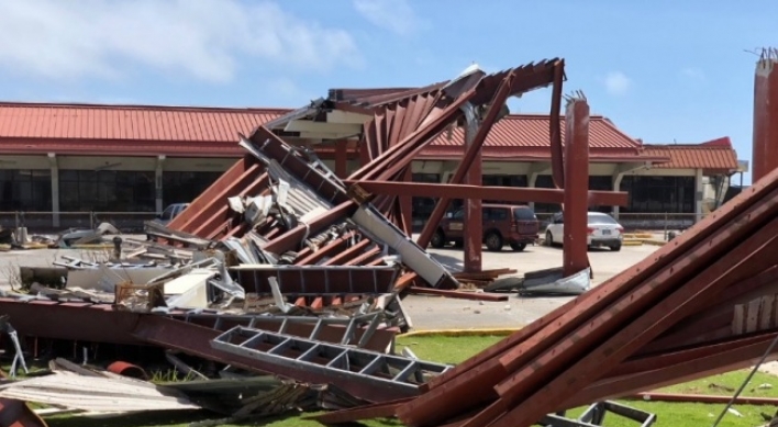 Typhoon crumbles homes, kills 1 in Northern Mariana Islands