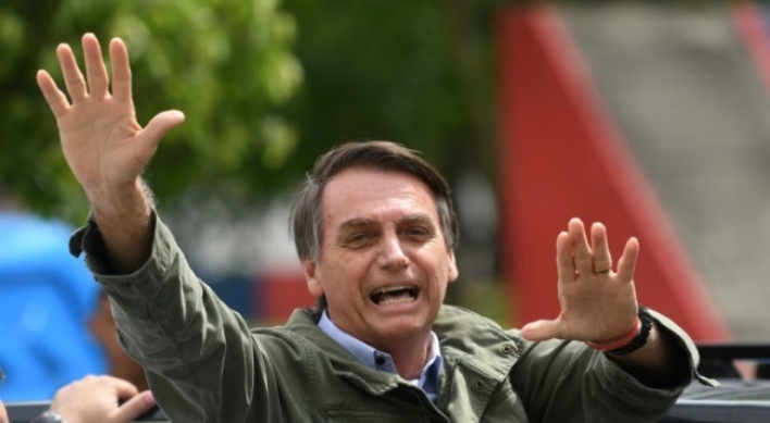 Far-right army man Bolsonaro wins Brazil vote