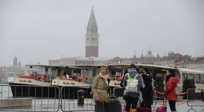 Venice hit by high tide as Italy buffeted by winds; 6 killed