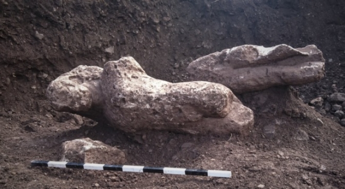 More ancient statues, graves unearthed in a Greek field